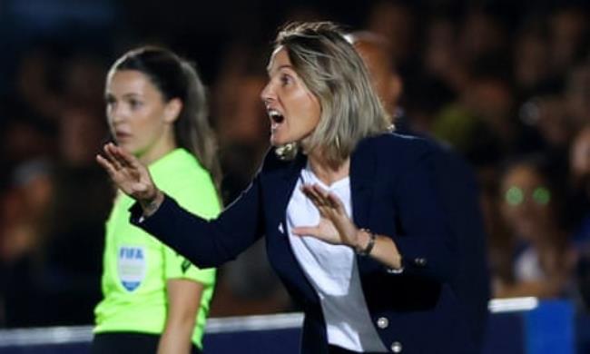 Sonia Bompastor gesticulates on the touchline